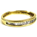 An 18ct yellow gold and diamond set half eternity ring, the row of baguette cut stones approximately... 