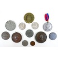 A group of commemorative medallions and tokens, 18th to 20th century, including George V and Edward ... 