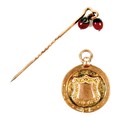 A George V 9ct gold fob pendant, cast with a shield encircled by a belt, loop attached, P&M, Chester... 