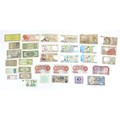 A group of thirty three GB and World bank notes, including three 10 Shillings, a Confederate States ... 