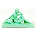 After Levallois François (French, 1882-1965): an Art Deco figural group with female reclining nude w... 