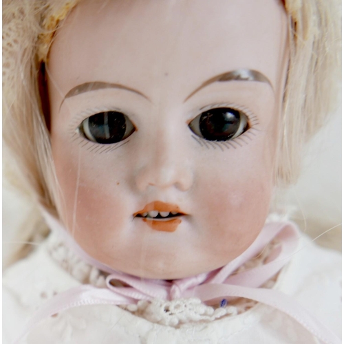 144 - A late 19th century Armand Marseille bisque shoulder head doll, stamped '37.0 A.M. 4/0 DEP Made in G... 