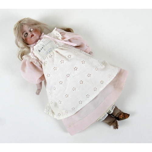 144 - A late 19th century Armand Marseille bisque shoulder head doll, stamped '37.0 A.M. 4/0 DEP Made in G... 