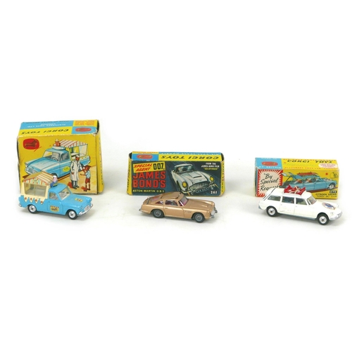 145 - Three Dinky Toys die-cast toy models, comprising a James Bond DB5 in gold, a 447 Walls Ice Cream van... 