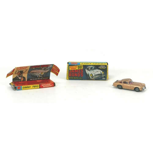 145 - Three Dinky Toys die-cast toy models, comprising a James Bond DB5 in gold, a 447 Walls Ice Cream van... 