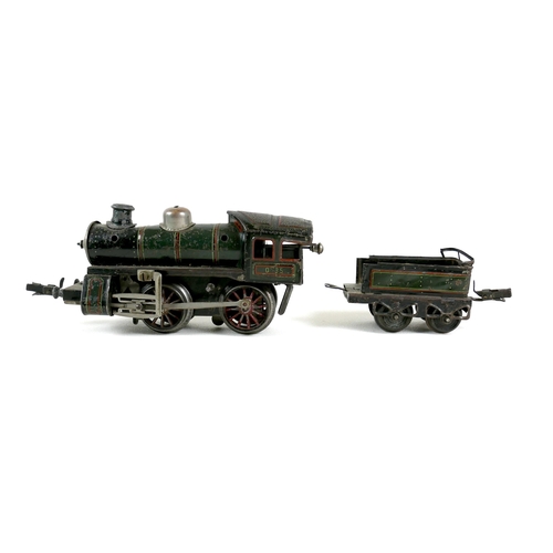 150 - A collection of O gauge tinplate railway, early 20th century, including a clockwork Bassett-Lowke 4-... 