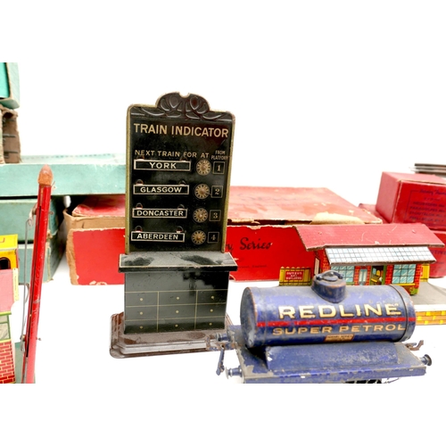 150 - A collection of O gauge tinplate railway, early 20th century, including a clockwork Bassett-Lowke 4-... 