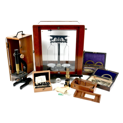 153 - A group of scientific instruments, including a vintage set of Baird & Tatlock laboratory scales, 35 ... 