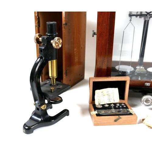 153 - A group of scientific instruments, including a vintage set of Baird & Tatlock laboratory scales, 35 ... 