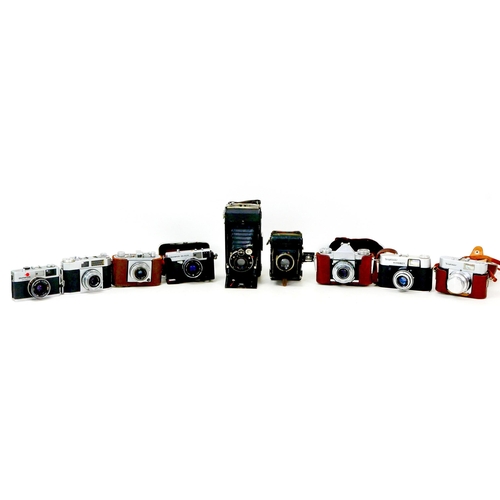 155 - A group of vintage and retro cameras, including three Zeiss cameras an Ikon Contaflex I, a Ikon Comp... 