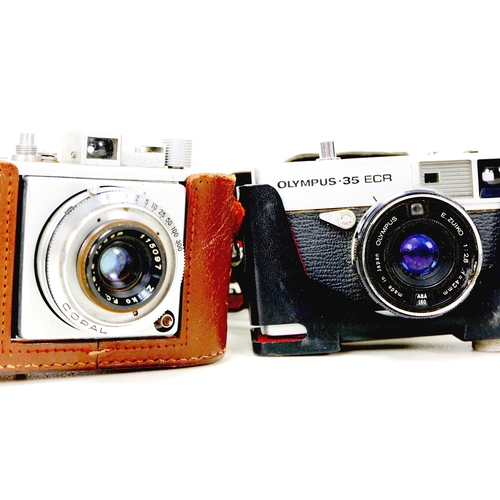 155 - A group of vintage and retro cameras, including three Zeiss cameras an Ikon Contaflex I, a Ikon Comp... 