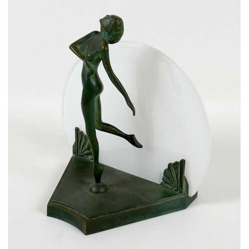 164 - An Art Deco bronze table lamp, in the style of Max Le Verrier, modelled as a young female nude stand... 