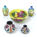 A group of five pieces of Moorcroft pottery, including a bowl, 15.5 by 7cm high, without box, togeth... 