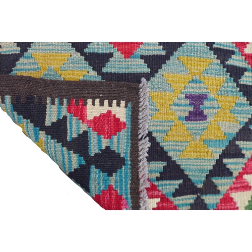 230 - A Maimana Kilim runner, with diamond patterned ground, yellow, red, blue, green, and white, encased ... 