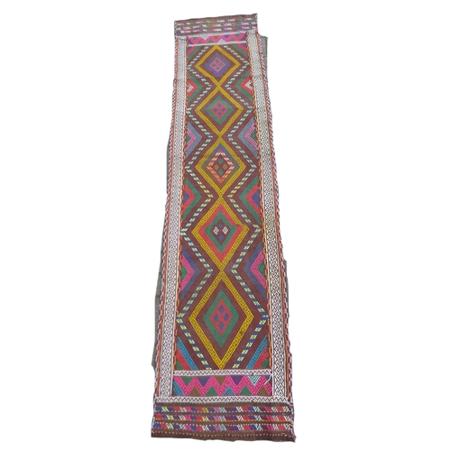 239 - An old Suzni Kilim runner, with five central, caucasian, orange, purple and blue bands of colour, 24... 