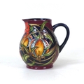 A Moorcroft pottery Pleuriana pattern water jug, by Rachel Bishop, with impressed marks to its base,... 