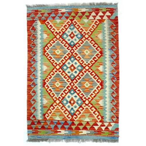 244 - A Chobi Kelim rug, with three central blue and white diamonds to the multicolour ground, and stylize... 