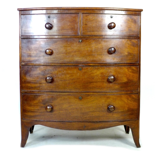 246 - A Victorian bow fronted mahogany chest of drawers, with two over three drawers, raised on splayed su... 