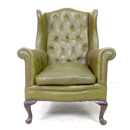 248 - Two wingback armchairs, comprising a Georgian style wingback armchair, in blue floral fabric, a/f up... 