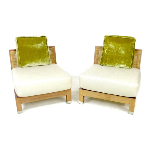 258 - A pair of modern Italian Flexform low side chairs, each with woven backs and oversized cream fabric ... 