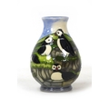 A Moorcroft pottery Puffin Bird baluster vase, by Philip Gibson, with impressed marks to its base, 9... 