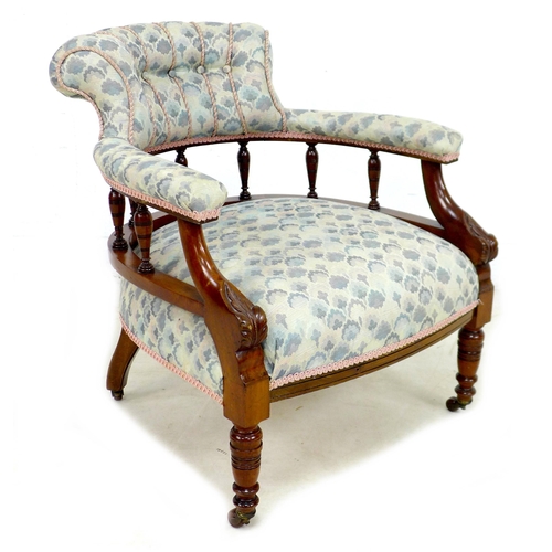 266 - A Victorian mahogany tub chair, with spindle supported scroll back, overstuffed in pale blue fabric ... 