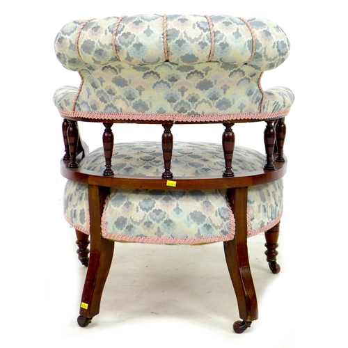 266 - A Victorian mahogany tub chair, with spindle supported scroll back, overstuffed in pale blue fabric ... 