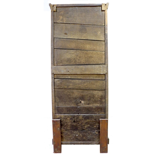 281 - A French oak freestanding larder cupboard, late 19th century, with single metal latticed grill and c... 