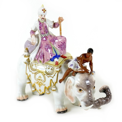 A Meissen porcelain figure group, modelled as 'Persian with Elephant', early to mid 20th century, depicting a sultan enthroned on a richly attired elephant, with a blackamoor driver seated on its head, outlined in gilt, impressed number (pressnummer) '67019' and '279M', after the model by Johann Joachim Kändler and perhaps Peter Reinicke, underglaze blue crossed swords mark, and red painted '49', 28.5 by 12 by 26cm high.