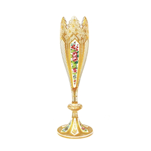 67 - An early 20th century bohemian glass spill vase, decorated with floral panels and gilt highlights, w... 