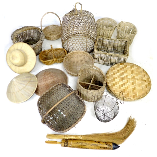 71 - A collection of wicker items, including baskets and hats. (17)