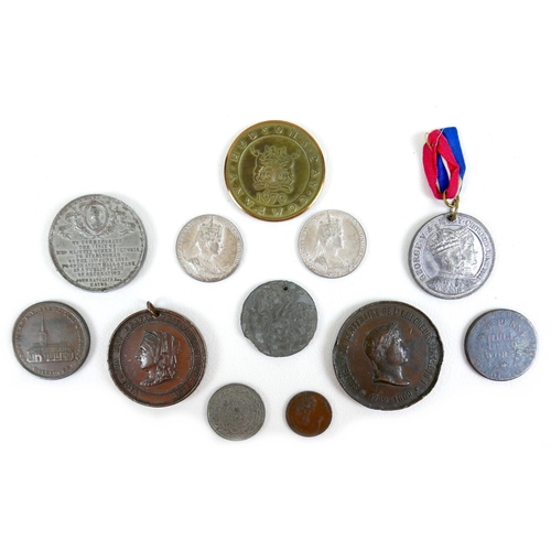 81 - A group of commemorative medallions and tokens, 18th to 20th century, including George V and Edward ... 