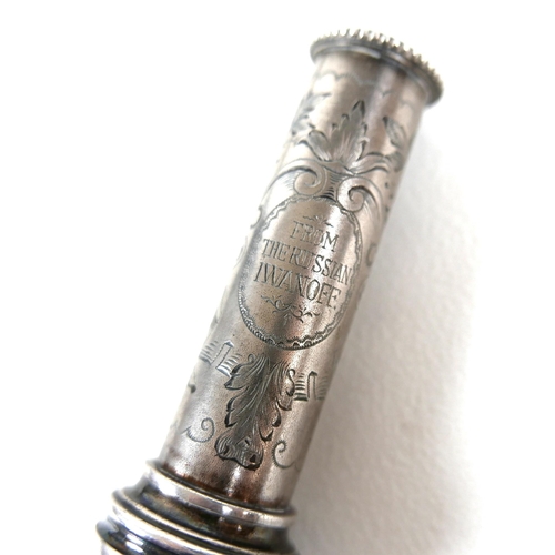 87 - A mid 19th century silver mounted ebony conductor's presentation baton, engraved to a spiralling wra... 