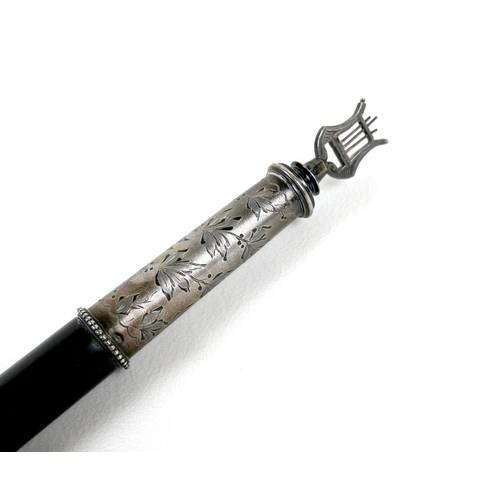 87 - A mid 19th century silver mounted ebony conductor's presentation baton, engraved to a spiralling wra... 