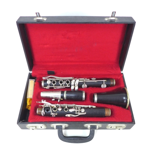 91 - A Boosey & Hawkes rosewood five piece clarinet, with white metal mounts, serial number '173867' and ... 