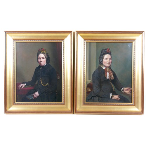 89 - A pair of Victorian portraits, both half length, each depicting a woman in black dress and bonnets, ... 