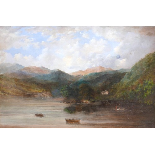 83 - British School (19th century): a mountainous lake landscape, with three rowing boats on the water, a... 