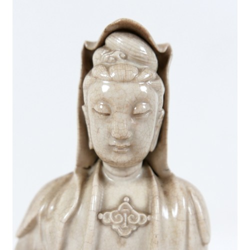 38 - A Chinese blanc de chine porcelain sculpture, probably 18th century, modelled as Guanyin, in seated ... 