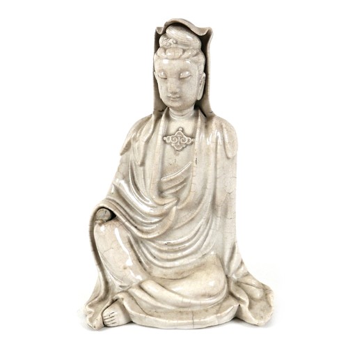 38 - A Chinese blanc de chine porcelain sculpture, probably 18th century, modelled as Guanyin, in seated ... 