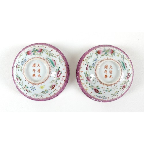 57 - A pair of Chinese porcelain bowls, early to mid 20th century, decorated in famille rose palette with... 