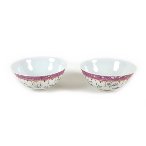 57 - A pair of Chinese porcelain bowls, early to mid 20th century, decorated in famille rose palette with... 