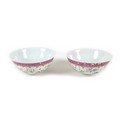 A pair of Chinese porcelain bowls, early to mid 20th century, decorated in famille rose palette with... 