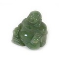 A Chinese carved jade Buddha, 4.5cm high.