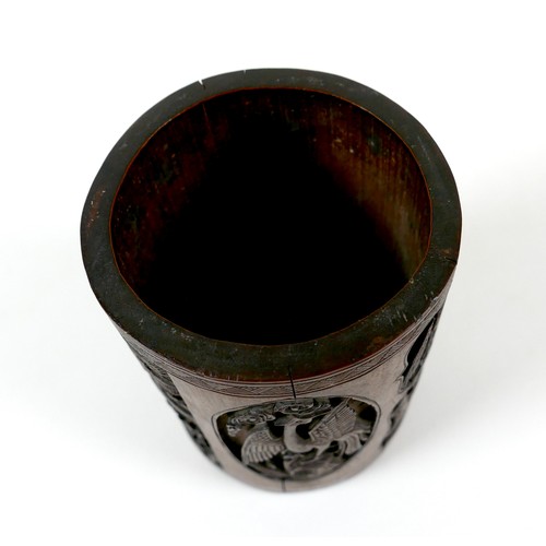 43 - A Chinese bamboo brush pot (bitong), 19th century, of cylindrical form, carved in relief with a land... 
