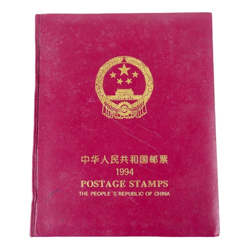 7 - An album of Chinese postage stamps, including commemorative examples.