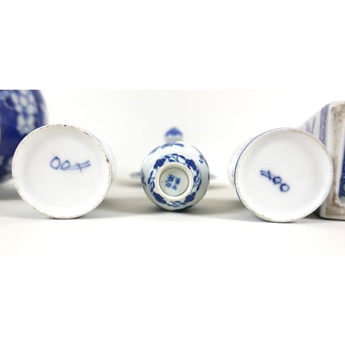 28 - A collection of Chinese & Japanese porcelain, comprising a Kangxi style tea bowl, a cracked ice and ... 