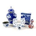 A collection of Chinese & Japanese porcelain, comprising a Kangxi style tea bowl, a cracked ice and ... 