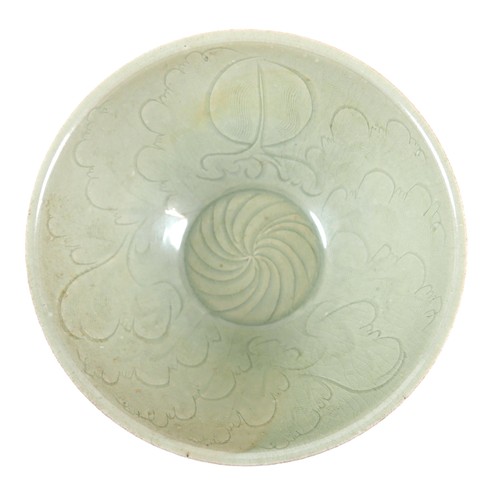 13 - A Chinese porcelain bowl, late 20th century, incised decoration beneath a green glaze, 18.5 by 8cm h... 