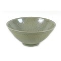 A Chinese porcelain bowl, late 20th century, incised decoration beneath a green glaze, 18.5 by 8cm h... 