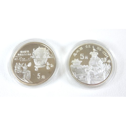 16 - A small group of Chinese coins and banknotes, comprising two silver proof 5 dollar coins, '5000 year... 